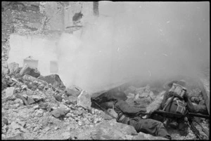 Soldiers use smoke screen on manoeuvres in the Cassino area, Italy - Photograph taken by George Kaye