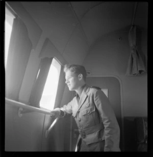 Portrait of Eric Newman, junior steward, aboard a Hobart flying boat