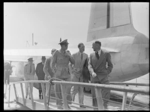 Lord Winster and members of his party, stepping off a Hobart flying boat, Mechanics Bay, Auckland