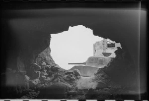NZ Sherman tank seen through ruins of a village on the Cassino Front, Italy, World War II - Photograph taken by George Kaye