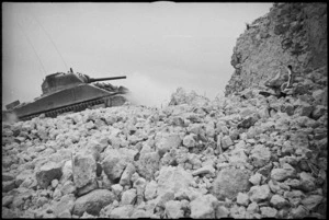 NZ Sherman tank among ruins of village on the Cassino Front, Italy, World War II - Photograph taken by George Kaye