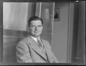 Portrait of R Jose, Pan American Airways Traffic Manager for Auckland, location Whites Aviation Offices, Auckland