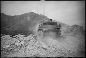 Rear view of NZ Sherman tank among ruins of village on the Cassino Front, Italy, World War II - Photograph taken by George Kaye