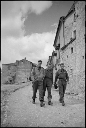 Three New Zealanders in an Italian village near the Italian battlefront, World War II - Photograph taken by George Kaye
