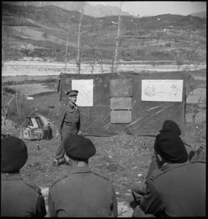 Major H T Knights uses blackboard to illustrate lecture at NZ Malaria School in the Volturno Valley, Italy, World War II - Photograph taken by M D Elias