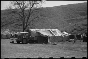 Tarpaulin lean to used as an operating theatre at 6 NZ Field Ambulance Unit in Italy, World War II - Photograph taken by George Bull