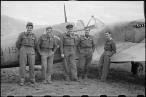 Group of NZ personnel serving with the RAF on one of the most forward Spitfire aerodromes in Italy, World War II - Photograph taken by George Bull