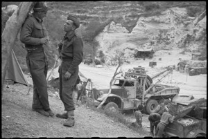 C Hoskins and D Kenny in general view of the Recovery Section at Hove Dump, Cassino area, Italy, World War II - Photograph taken by George Bull