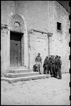New Zealand soldiers on leave look at old world architecture in Campobasso, Italy, during World War II - Photograph taken by George Bull