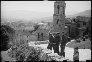 New Zealanders look over the scenery from the old castle hill at Campobasso, Italy, during World War II - Photograph taken by George Bull