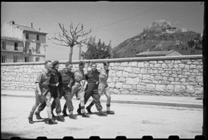 Group of New Zealand troops on leave make friends with Canadian troops in Campobasso, Italy, World War II - Photograph taken by George Bull