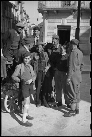New Zealand troops on leave meet a gharri driver for sightseeing in Campobasso, Italy, during World War II - Photograph taken by George Bull