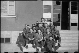 Group of New Zealand front-line troops with staff members of 200 Rest Home in Campobasso, Italy, during World War II - Photograph taken by George Bull