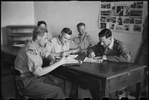 Men write home while on leave at 200 Rest Home in Campobasso, Italy, during World War II - Photograph taken by George Bull