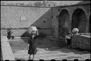 Women of Campobasso, Italy, still use the old Roman washing place for their laundry - Photograph taken by George Bull