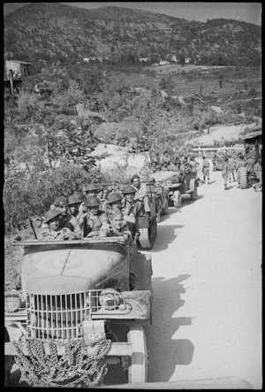 Infantrymen advance in transports to the forward area as Allies advance past Cassino, Italy, World War II - Photograph taken by George Kaye