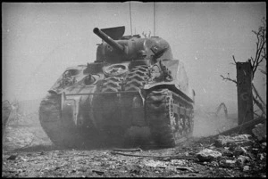 New Zealand tank advances on Cassino the day it fell to 8th Army, Italy, World War II - Photograph taken by George Kaye