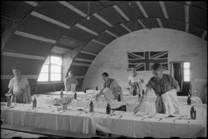 Preparing the Sergeant's Mess for a formal dinner at 1 NZ Convalescent Depot in Santo Spirito, Italy, World War II - Photograph taken by George Bull