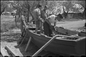 Building a boat for use of patients at 1 NZ Convalescent Depot at Santo Spirito, Italy, World War II - Photograph taken by George Bull