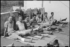 Patients exercising their legs with remedial exercises at 1 NZ Convalescent Depot at Santo Spirito, Italy, World War II - Photograph taken by George Bull