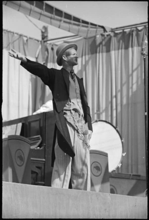 Comedian John Reidy entertains New Zealanders at Kiwi Concert Party's first Italian appearance in World War II - Photograph taken by George Kaye