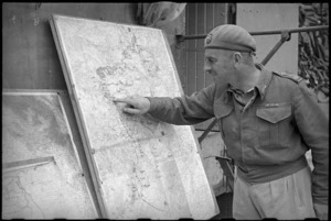 Brigadier Cyril Weir consults artillery plan in the Volturno Valley area, Italy, World War II - Photograph taken by George Kaye
