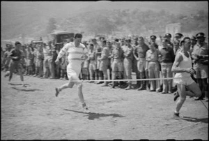 A Jones and W Mulholland, first and second placings, in heat of 220 yards race at 5 NZ Infantry Brigade Sports Meeting, Italy - Photograph taken by George Kaye
