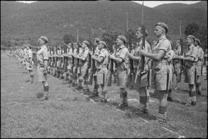 Officers and men of 4 New Zealand Armoured Brigade lined up on ceremonial parade in Volturno Valley, Italy, World War II - Photograph taken by George Kaye