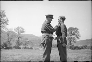 T/Major V J Tanner receiving the DSO from General Freyberg, Volturno Valley, Italy, World War II - Photograph taken by George Kaye