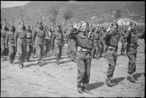 Officers and men of 5 NZ Infantry Brigade marching past in the Volturno Valley area, Italy, World War II - Photograph taken by George Kaye