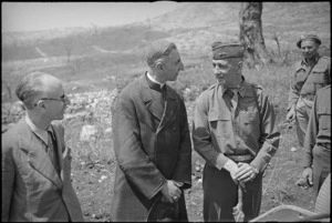 Chief Prior of Abbey Cassino talking to an American officer among ruins of the Abbey, Italy, World War II - Photograph taken by George Frederick Kaye