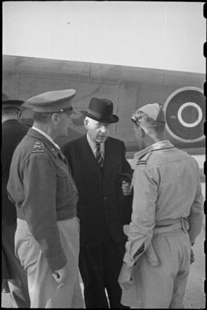 Prime Minister Peter Fraser with General Bernard Freyberg and Sergeant Norris at airport near Naples, Italy, World War II - Photograph taken by George Bull