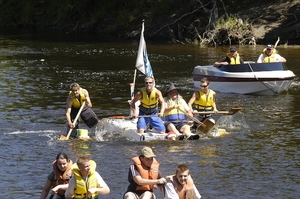 Photographs relating to raft racing, West Coast Region