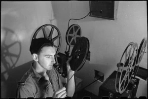 R Mirams film projectionist at 1 New Zealand General Hospital, Molfetta, Italy, World War II - Photograph taken by George Bull