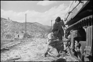 NZ tank recovery men salvaging a tank in Cassino, Italy, World War II - Photograph taken by George Kaye