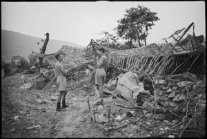 Camouflaged gunpit and living quarters of NZ Divisional Artillery members on Cassino Front, Italy, World War II - Photograph taken by George Kaye