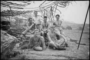 Gun crew of a NZ Divisional Artillery gun in the Cassino area, Italy, World War II - Photograph taken by George Kaye