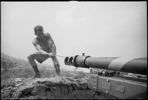 H F Mathieson pulling through one of NZ Divisional Artillery guns after heavy fighting in Cassino area, Italy, World War II - Photograph taken by George Kaye