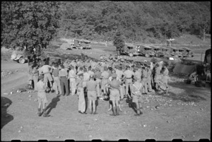 NZ Prime Minister Peter Fraser talking to 6 NZ Field Ambulance personnel in Volturno Valley, Italy, World War II - Photograph taken by George Bull
