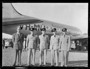 ANA (Australian National Airways) flight staff - Mr Morrissey, Mr Taylor, Mr Way, Mr Lovell and Mr Gibbs, in front of passenger aircraft Douglas DC-4 Skymaster Amana