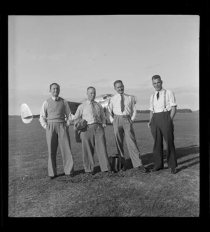 Portrait of (l to r) Messrs S Wiltshire, J Walker, J Winefield, H Mangham, Union Airways personnel, Mangere, Auckland