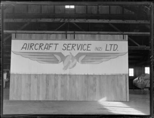 Aircraft Service Limited signboard within an aeroplane hangar, Mangere Airfield, Auckland