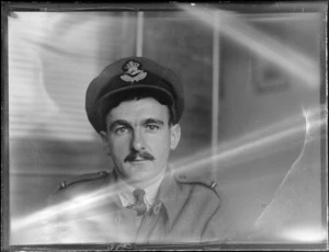 Portrait of Flying Officer D Gray ACC and 40th Squadron in uniform, Whites Aviation Office, Auckland