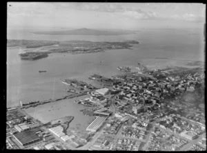 Auckland City, including wharves and Rangitoto Island in the distance