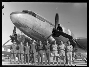 Unidentified RNZAF Survey men standing in front of a C47 aircraft, as it departs for Japan, Whenuapai, Auckland