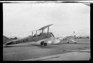 View of Auckland Aero Clubs' ZK-AIB Tiger Moth and ZK-AHE Taylor Cub planes, Mangere Airfield, Auckland