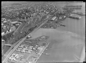 View of Mechanics Bay and the Ports of Auckland dock area, with Auckland Railway Station and the city CBD beyond