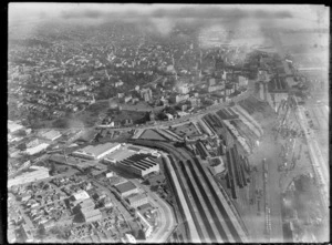 View of Auckland Railway Station and yards in foreground, looking to the Auckland City CBD