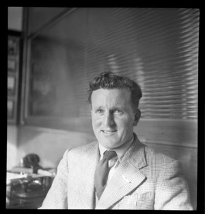Portrait of Neville Brockett, Whites Aviation Office, Auckland