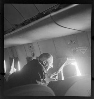 View of R Laidlow on a Pan American Airways Clipper Class Cathay DC4 Good Will Flight, Whenuapai Airfield, Auckland
